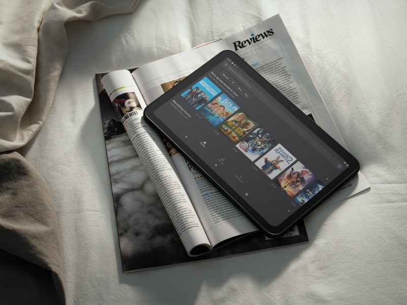 tablet on top of a magazine